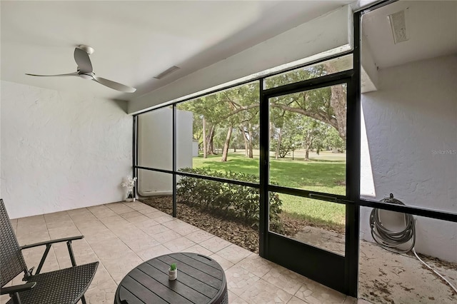 4175 Northmeadow Cir Unit 4175, Tampa, FL 33618 - unfurnished sunroom with ceiling fan