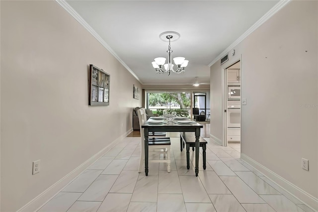 4175 Northmeadow Cir Unit 4175, Tampa, FL 33618 - dining room featuring a chandelier, crown molding, and baseboards