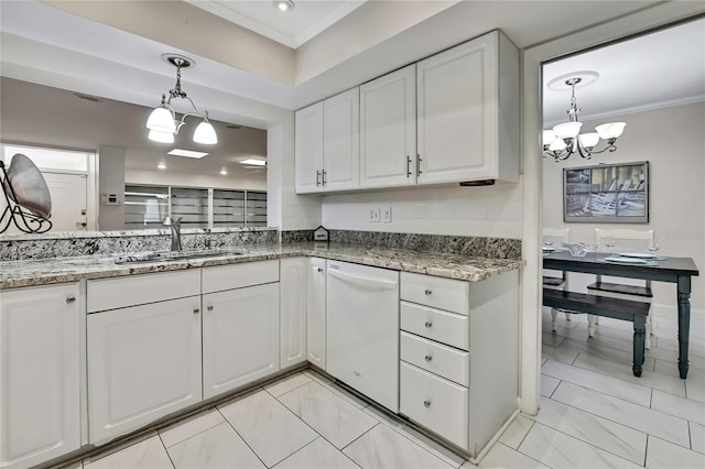 4175 Northmeadow Cir Unit 4175, Tampa, FL 33618 - kitchen with a sink, a chandelier, white dishwasher, crown molding, and white cabinetry