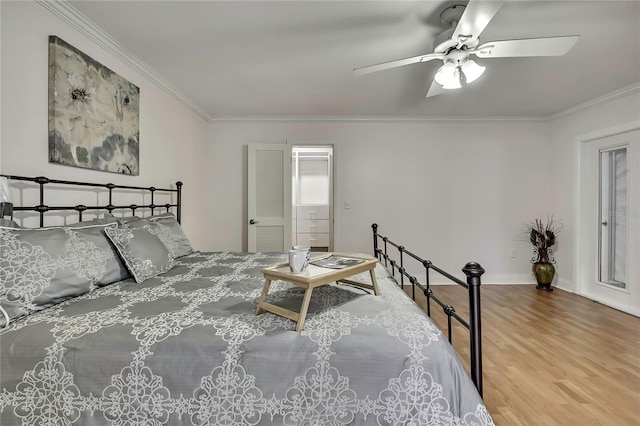 4175 Northmeadow Cir Unit 4175, Tampa, FL 33618 - bedroom featuring wood finished floors, ornamental molding, ceiling fan, and baseboards