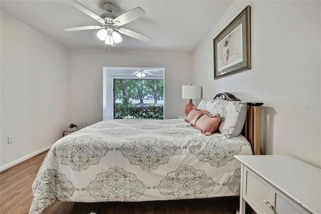 4175 Northmeadow Cir Unit 4175, Tampa, FL 33618 - bedroom featuring light wood finished floors, ceiling fan, and baseboards
