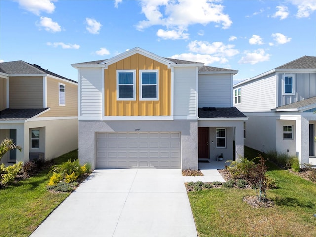 7797 Peace Lily Ave, Wesley Chapel, FL 33545 - view of front facade featuring driveway, board and batten siding, a front yard, and an attached garage