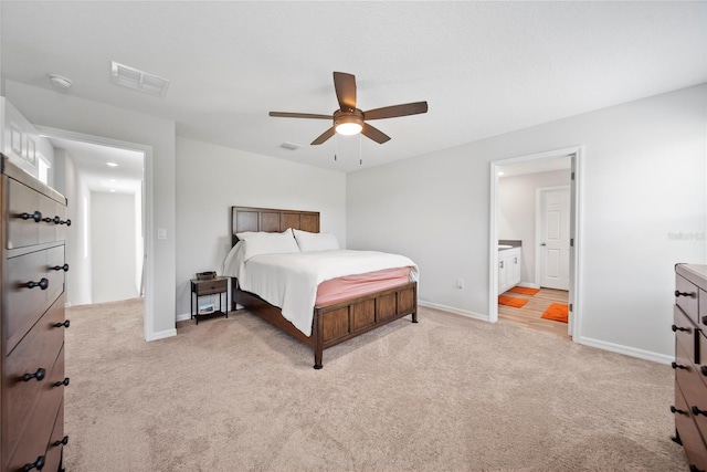 7797 Peace Lily Ave, Wesley Chapel, FL 33545 - bedroom with baseboards, visible vents, a ceiling fan, and light colored carpet