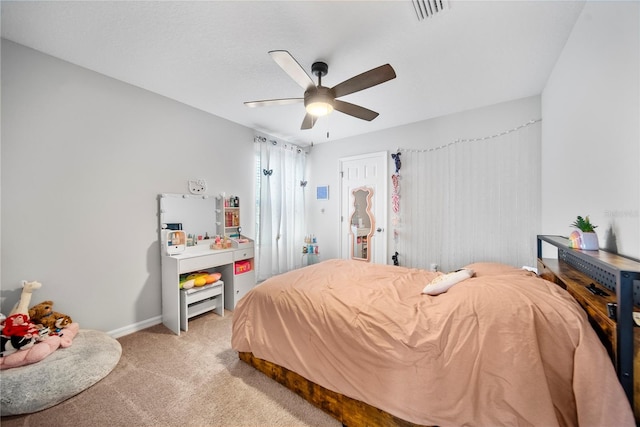7797 Peace Lily Ave, Wesley Chapel, FL 33545 - bedroom featuring a ceiling fan, visible vents, light colored carpet, and baseboards