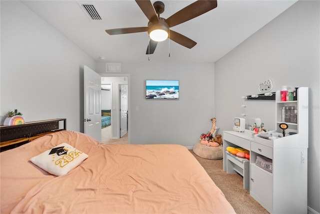 7797 Peace Lily Ave, Wesley Chapel, FL 33545 - bedroom featuring a ceiling fan, visible vents, and light carpet