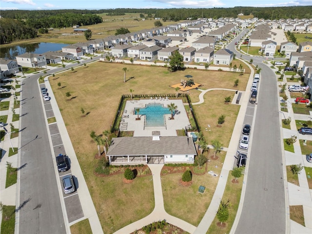 7797 Peace Lily Ave, Wesley Chapel, FL 33545 - birds eye view of property featuring a water view and a residential view