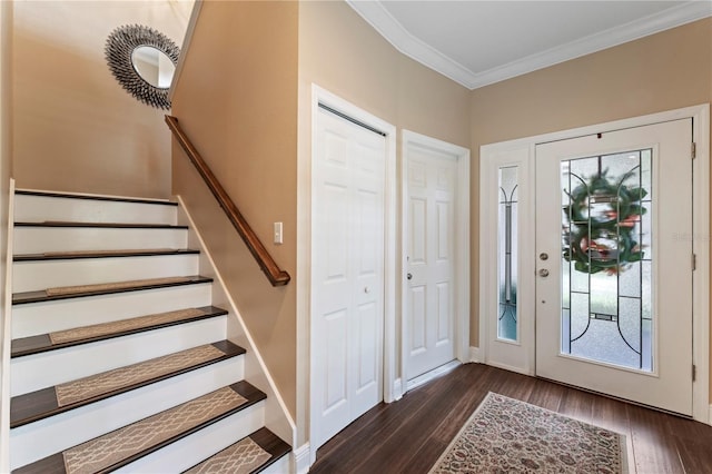 2701 W Bay Ave, Tampa, FL 33611 - foyer entrance with a healthy amount of sunlight, ornamental molding, dark wood-style floors, and stairs