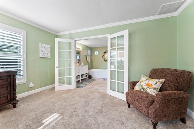 2701 W Bay Ave, Tampa, FL 33611 - sitting room with carpet floors, ornamental molding, baseboards, and visible vents