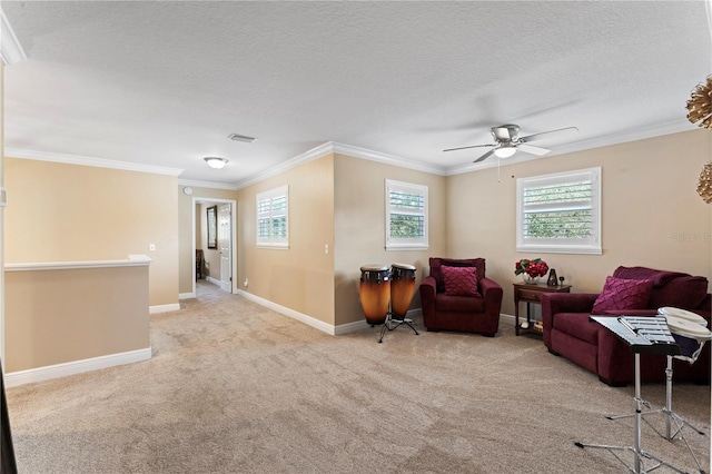 2701 W Bay Ave, Tampa, FL 33611 - sitting room with carpet flooring, baseboards, ornamental molding, and a healthy amount of sunlight