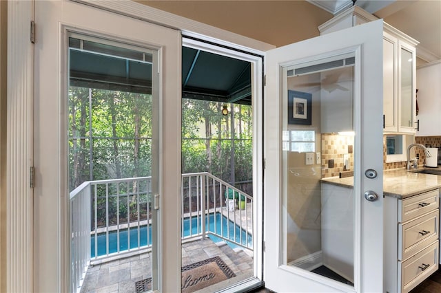 2701 W Bay Ave, Tampa, FL 33611 - entryway with a sink and a wealth of natural light