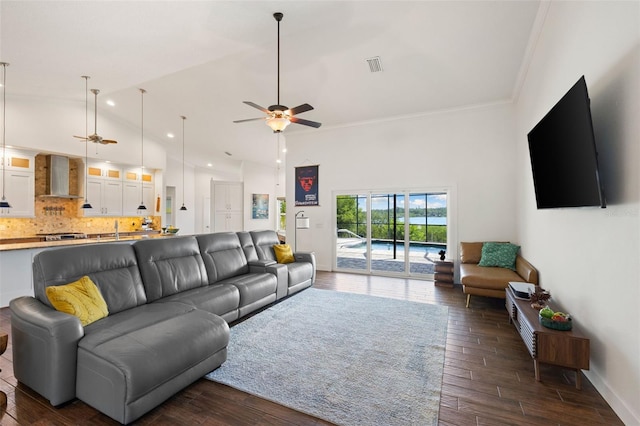 living room featuring visible vents, a ceiling fan, and dark wood-style floors
