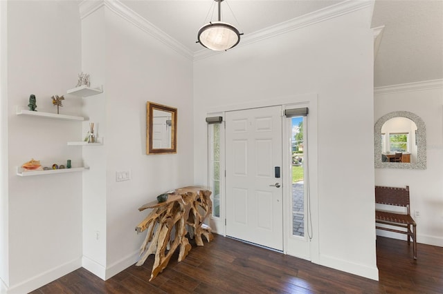 entrance foyer featuring crown molding, baseboards, and wood finished floors