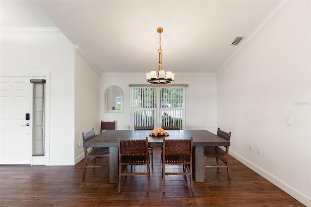 dining space with baseboards, an inviting chandelier, ornamental molding, and dark wood finished floors
