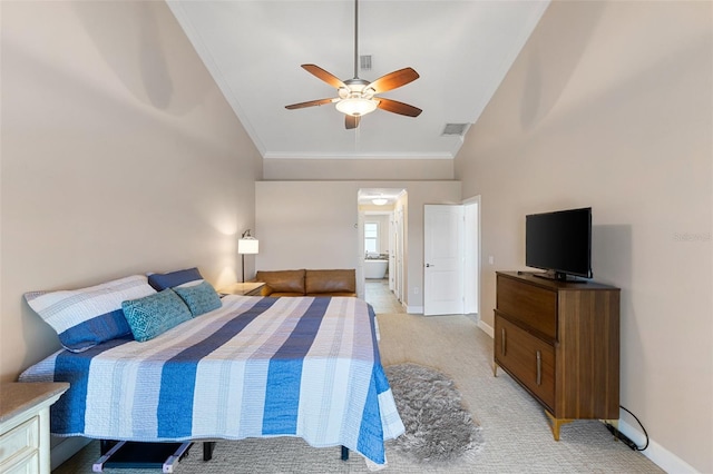 bedroom featuring visible vents, ornamental molding, lofted ceiling, and light colored carpet