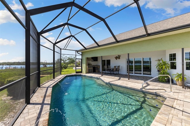 outdoor pool featuring a lanai, a patio, and a water view
