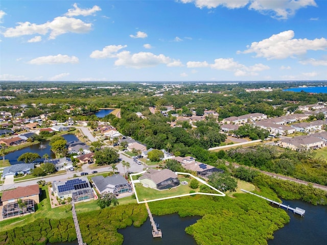 aerial view with a water view and a residential view
