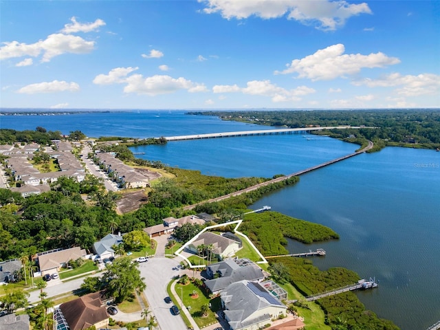 bird's eye view featuring a water view and a residential view