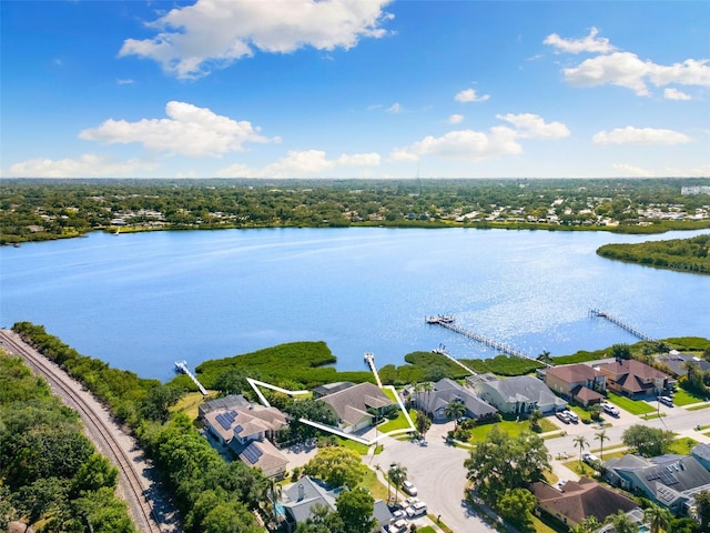 aerial view featuring a residential view and a water view