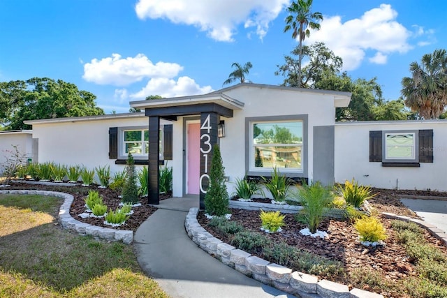 4310 S Coolidge Ave, Tampa, FL 33611 - view of front of house with stucco siding