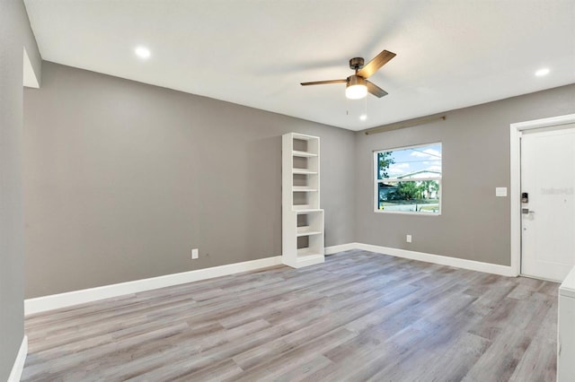 4310 S Coolidge Ave, Tampa, FL 33611 - empty room with recessed lighting, light wood-style flooring, ceiling fan, and baseboards