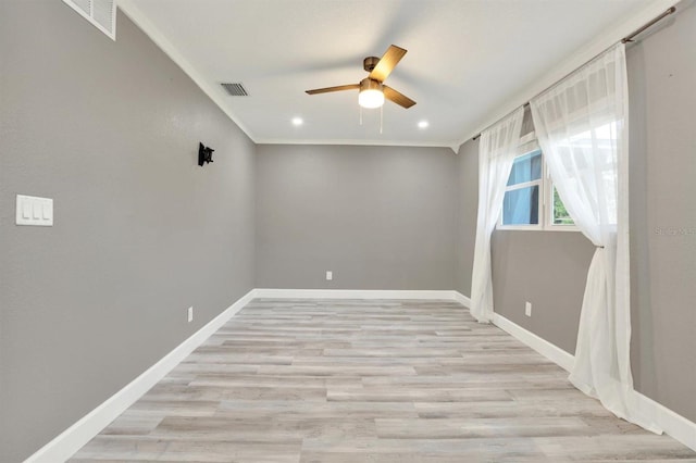 4310 S Coolidge Ave, Tampa, FL 33611 - empty room featuring crown molding, ceiling fan, light wood-style floors, baseboards, and visible vents