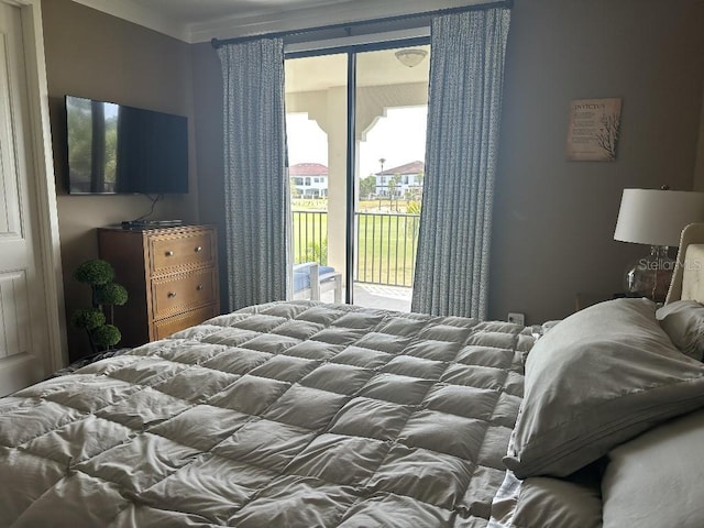 1056 Castle Pines Ct, Reunion, FL 34747 - bedroom featuring access to exterior