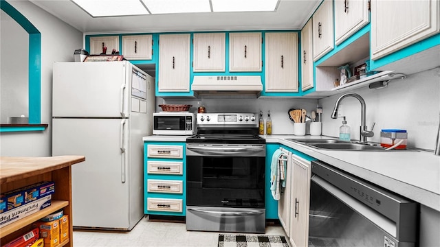 kitchen with exhaust hood, appliances with stainless steel finishes, open shelves, light countertops, and a sink