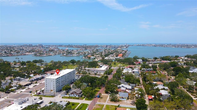drone / aerial view featuring a water view and a city view