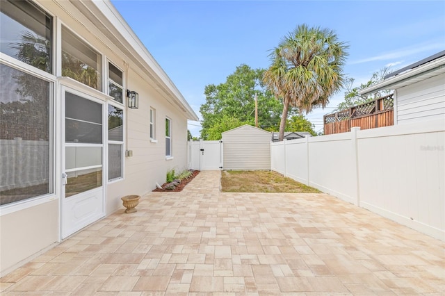 view of patio / terrace with a gate and a fenced backyard