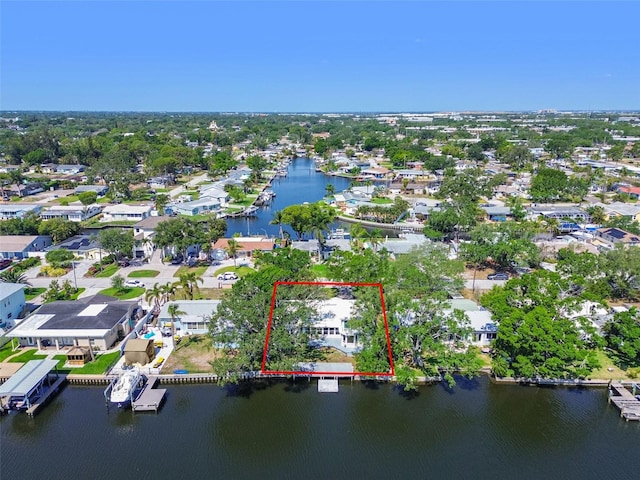 aerial view with a residential view and a water view
