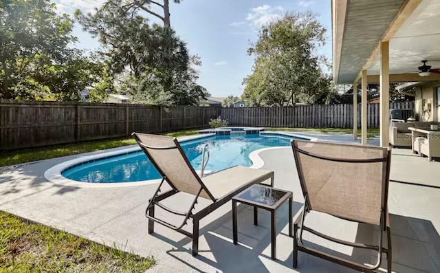 728 Alford St SE, Palm Bay, FL 32909 - view of swimming pool with a patio, a ceiling fan, and a fenced backyard