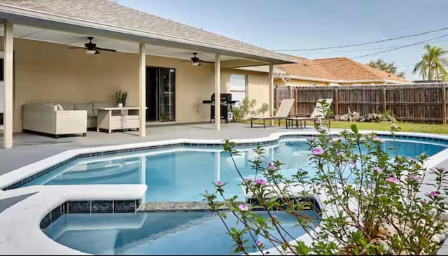 728 Alford St SE, Palm Bay, FL 32909 - view of pool featuring fence, a ceiling fan, a pool with connected hot tub, and a patio area