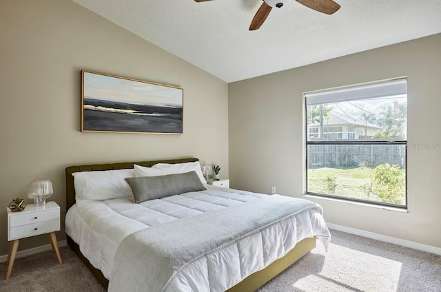728 Alford St SE, Palm Bay, FL 32909 - carpeted bedroom with a ceiling fan, baseboards, and vaulted ceiling