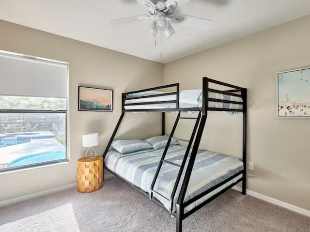 728 Alford St SE, Palm Bay, FL 32909 - bedroom featuring carpet floors, baseboards, and ceiling fan