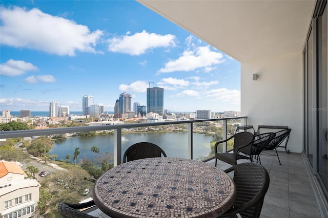 777 3rd Ave N Unit 1403, Saint Petersburg, FL 33701 - balcony featuring a view of city, a water view, and outdoor dining area