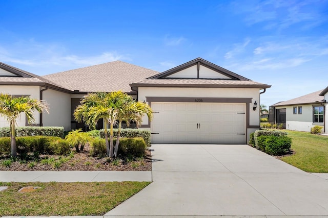 ranch-style home with an attached garage, driveway, a front lawn, and stucco siding