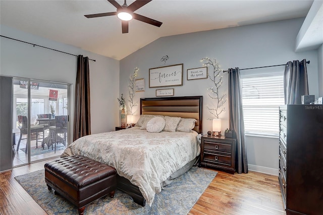 bedroom with ceiling fan, light wood-style floors, access to exterior, baseboards, and lofted ceiling