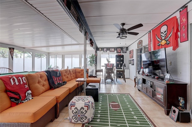 sunroom / solarium featuring tile patterned floors