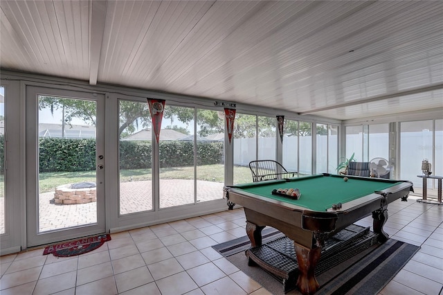 recreation room featuring light tile patterned floors, pool table, and a healthy amount of sunlight
