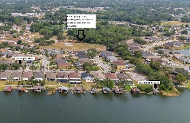 bird's eye view with a residential view and a water view
