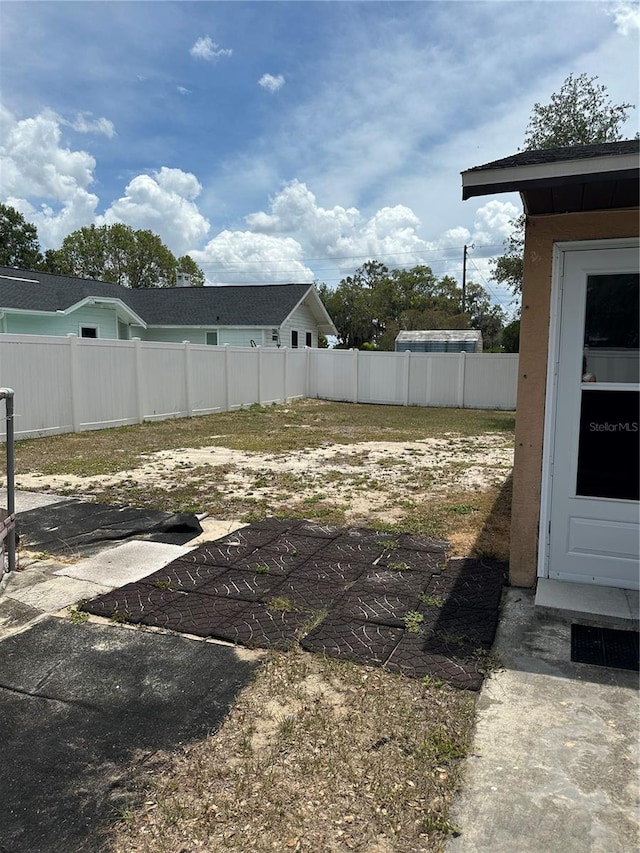 view of yard featuring fence