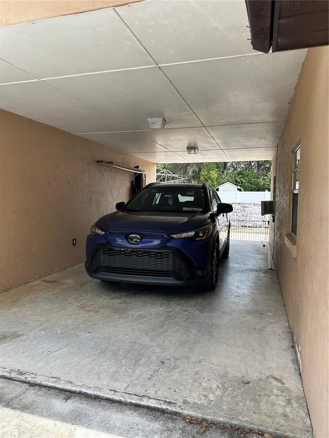 garage with a carport