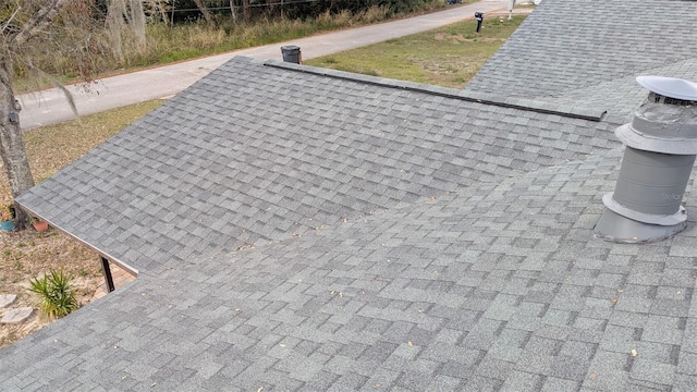 details featuring a shingled roof
