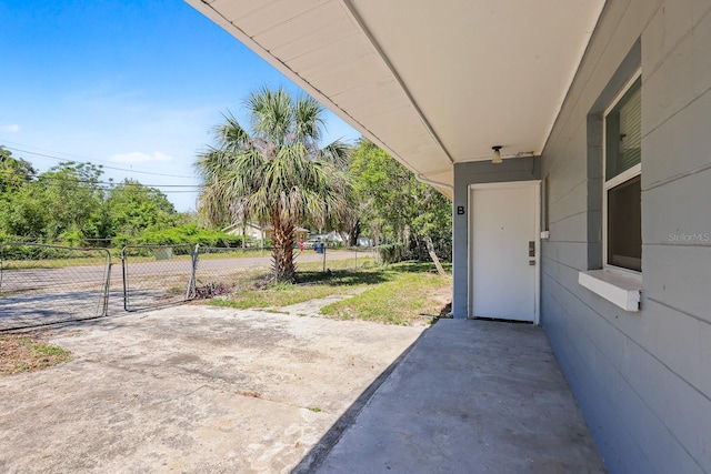 view of patio / terrace featuring fence