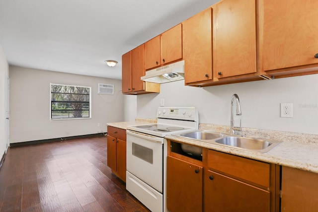 kitchen featuring dark wood-style flooring, white electric range, light countertops, under cabinet range hood, and a sink