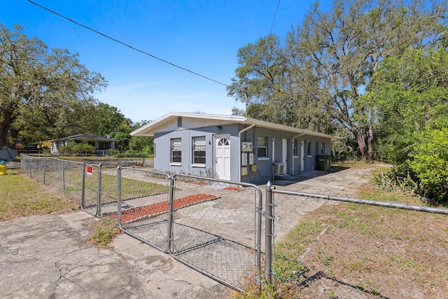 view of front of house featuring a gate and a fenced front yard
