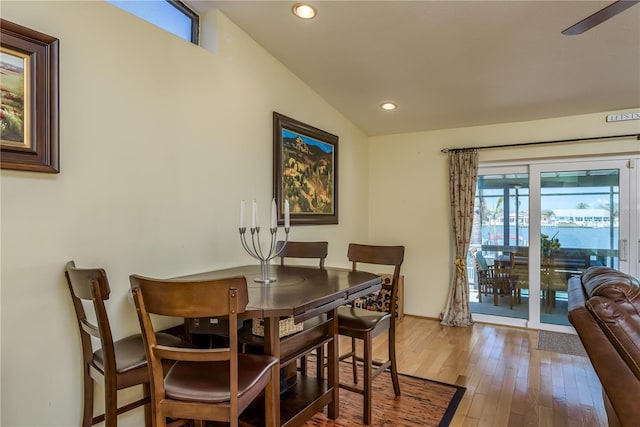 2202 Donato Dr, Belleair Beach, FL 33786 - dining area featuring a ceiling fan, recessed lighting, and wood finished floors