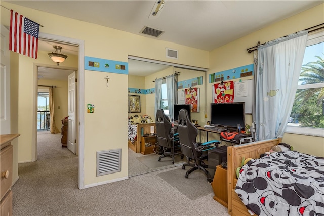 2202 Donato Dr, Belleair Beach, FL 33786 - bedroom featuring carpet floors, visible vents, and a closet