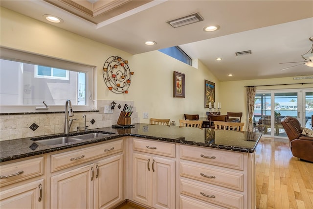 2202 Donato Dr, Belleair Beach, FL 33786 - kitchen with recessed lighting, visible vents, and a sink