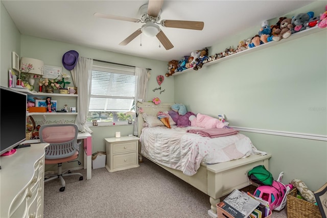 2202 Donato Dr, Belleair Beach, FL 33786 - bedroom with a ceiling fan and light carpet